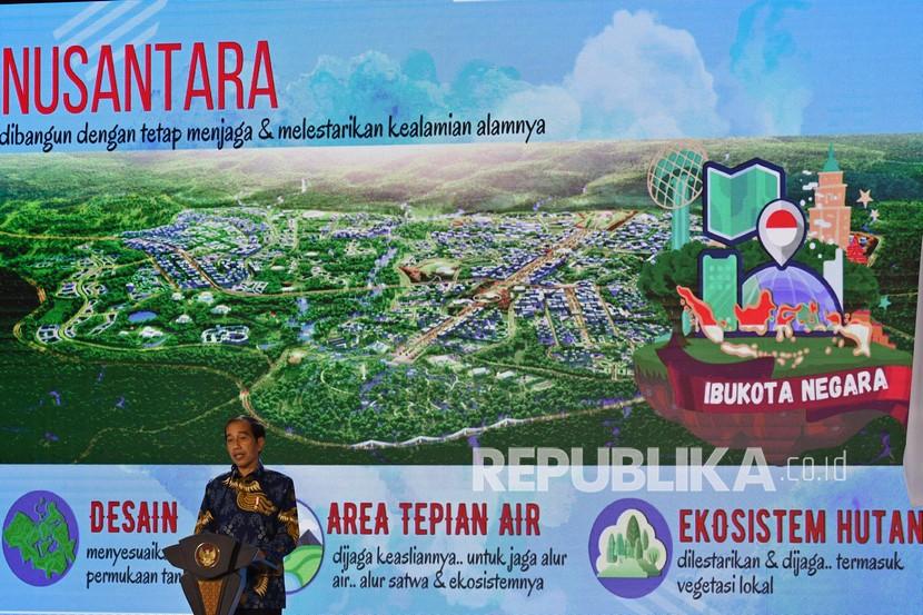 Presiden Joko Widodo menyampaikan paparan tentang pembangunan Ibu Kota Negara (IKN) Nusantara di sela peresmian gedung Nasdem Tower di Jakarta, Selasa (22/2/2022). Presiden mengatakan IKN Nusantara merupakankota berkonsep ‘smart forest city’ yang 70 persen wilayahnya merupakan area hijau, 80 persen kendaraan yang ada merupakan transportasi publik, dan 80 persen lebih didukung energi hijau dari ‘hydropower’ di Sungai Kayan.